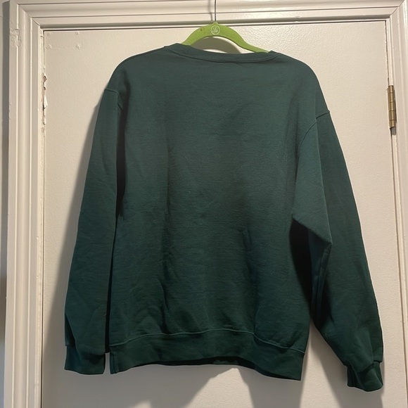 𝅺Santa Faux Cross Stitch Sweatshirt Winking Drinking a Beer saying, “Cheers!” - Picture 3 of 3